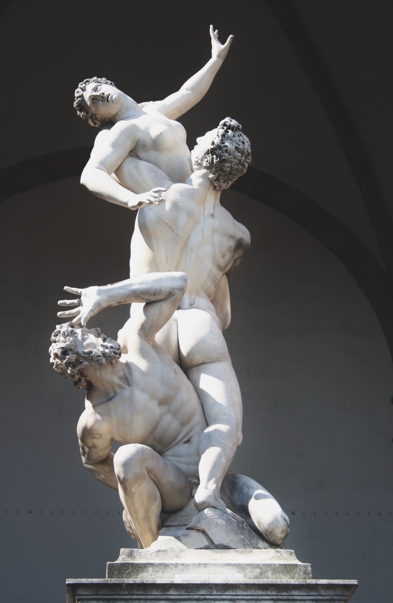 woman and men statue